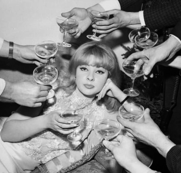 60s-woman-surrounded-by-champagne.jpg